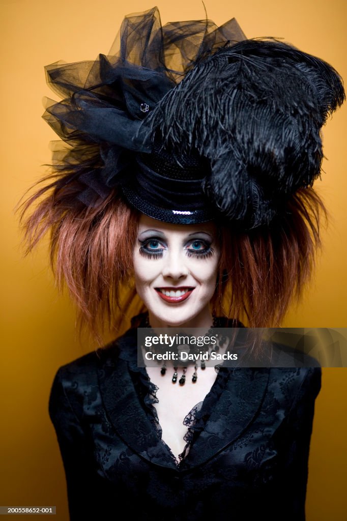Mid adult woman smiling, smiling, close-up, portrait