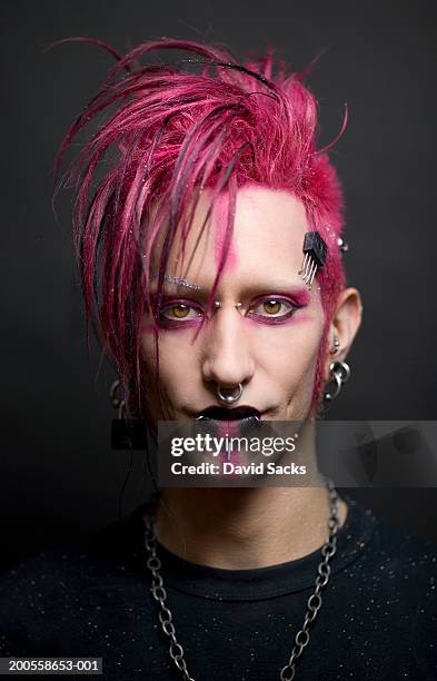 young man with facial piercing, close-up, portrait - punk stockfoto's en -beelden