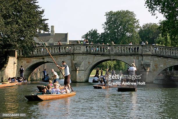 uk, england, cambridge, people punting on river cam near kings college - cambridge england stock pictures, royalty-free photos & images