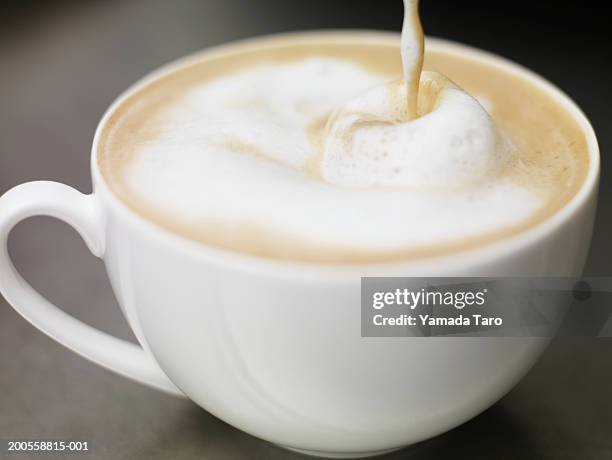 cup filled with coffee, close-up - coffee foam imagens e fotografias de stock