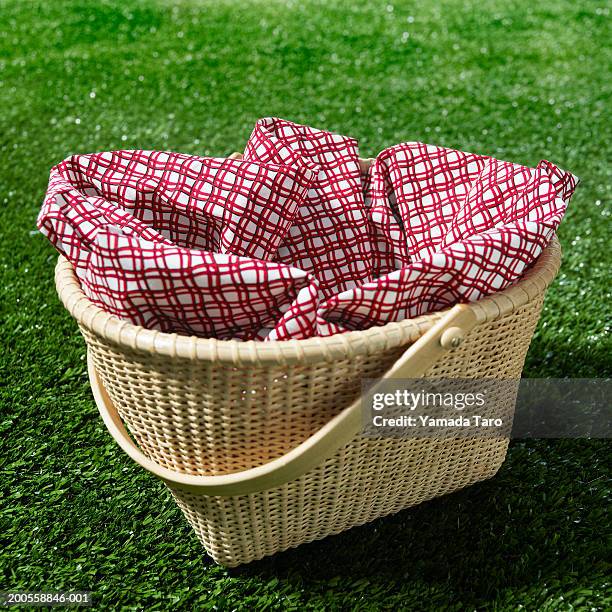 basket on grass - hamper stock pictures, royalty-free photos & images