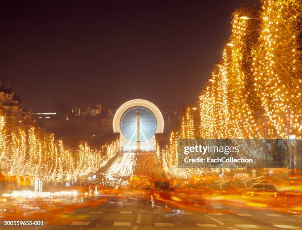 france,paris, avenue des champs-elysees decorated at christmas,night - champs elysees stock pictures, royalty-free photos & images