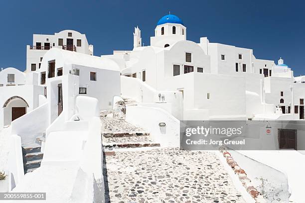 greece, cyclades, santorini, traditional houses, low angle view - santorini stock pictures, royalty-free photos & images