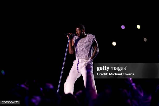 Usher performs during the Apple Music halftime show at the NFL Super Bowl 58 football game between the San Francisco 49ers and the Kansas City Chiefs...