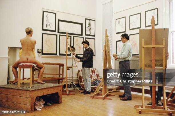 Winchester College, Wiltshire, students painting nude model.