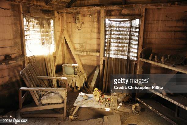 Montserrat, rPlymouth,ruined interior of house after volcanic eruption.