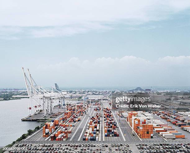 crane and cargo containers on pier, elevated view - harbour stockfoto's en -beelden