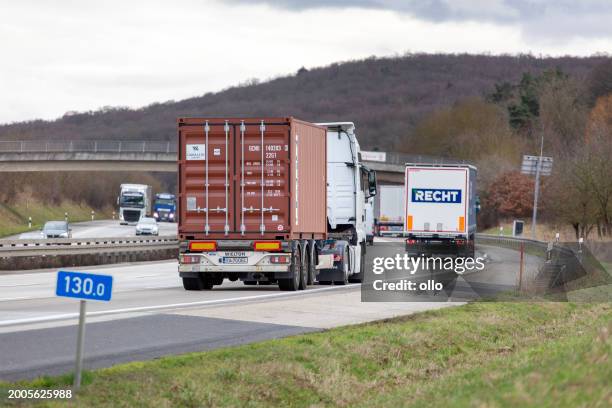 trucks and dense traffic on german highway a3 - rheingau stock pictures, royalty-free photos & images