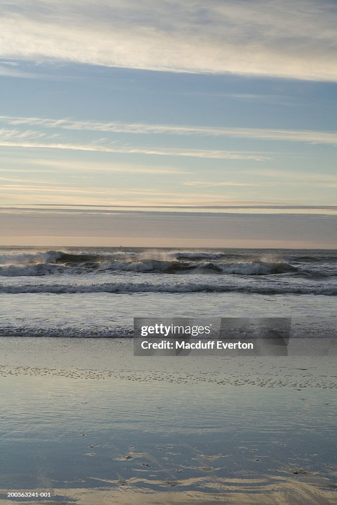 Waves on beach, dawn