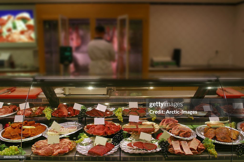 Fresh meat at counter in store, close-up