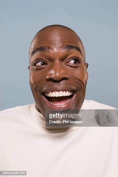 man laughing, close-up - gezichtsuitdrukking stockfoto's en -beelden
