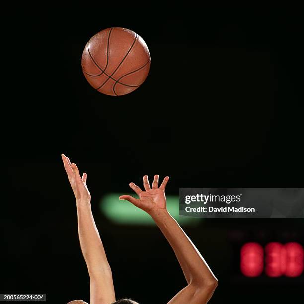 basketball player reaching for basketball, close-up - basketball close up ストックフォトと画像