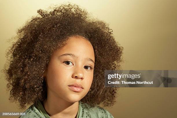 girl (10-11) with curly hair, close-up, portrait - curly girl stock pictures, royalty-free photos & images