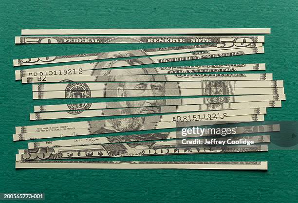 shredded us currency banknote, close-up - money laundering stock pictures, royalty-free photos & images