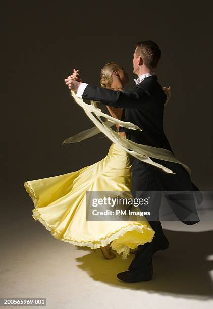 man and woman ballroom dancing - ballroom stockfoto's en -beelden