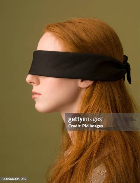 profile of young woman with blindfold, head and shoulders - blindfold stock pictures, royalty-free photos & images