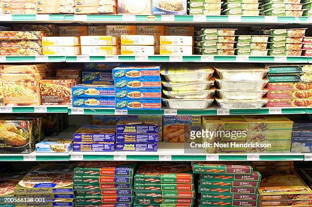 frozen foods section of grocery store - supermarket shelves ストックフォトと画像