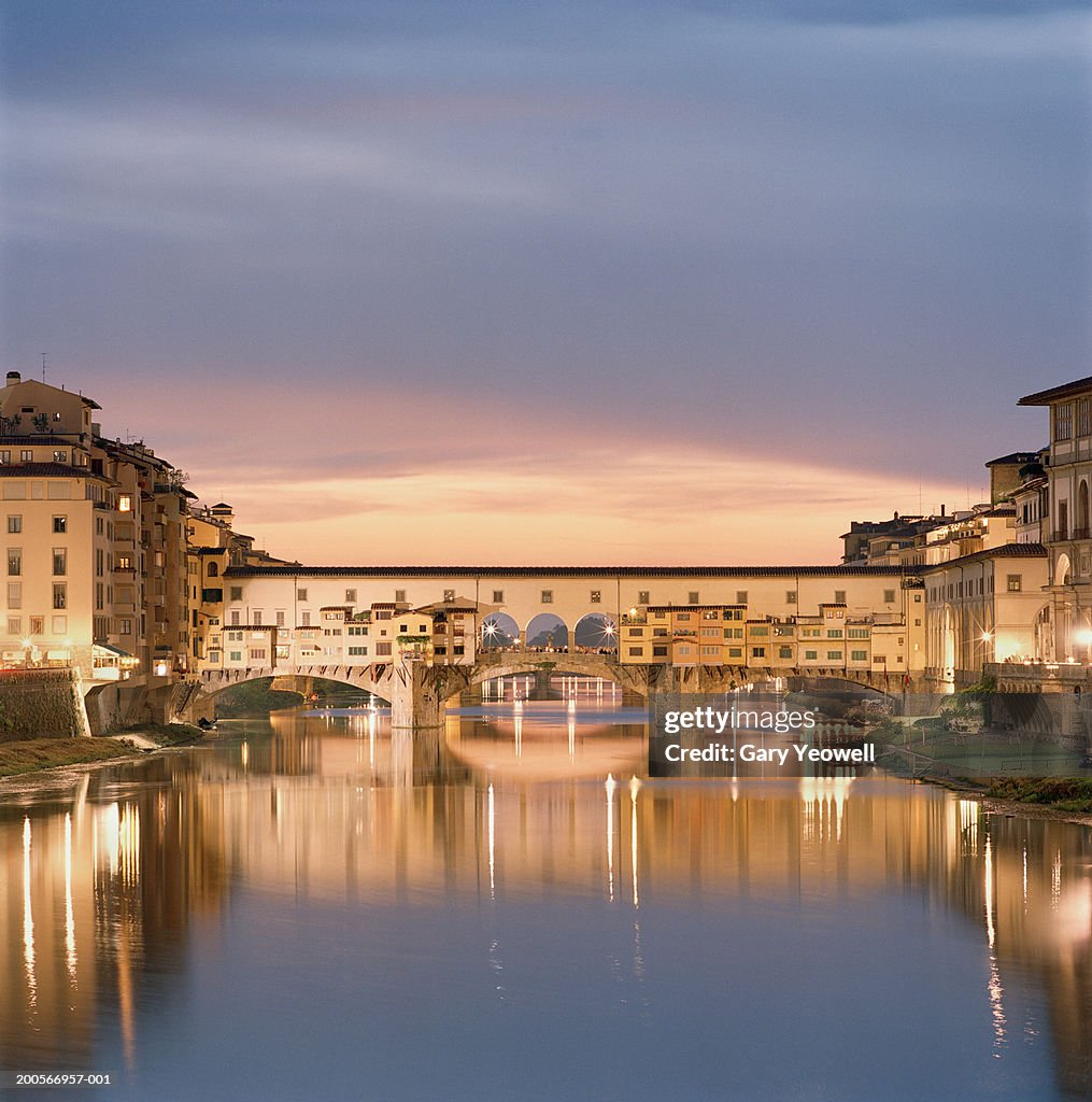 Italy, Tuscany, Florence, Ponte Vecchio reflected in Arno river