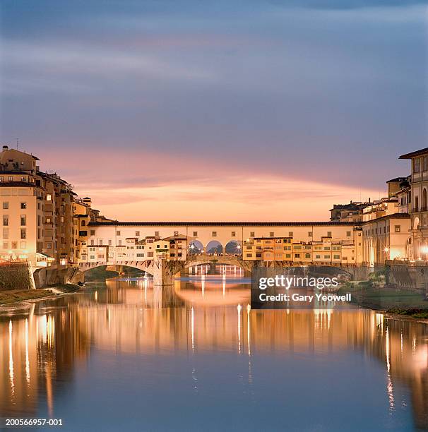 italy, tuscany, florence, ponte vecchio reflected in arno river - ponte vecchio bildbanksfoton och bilder