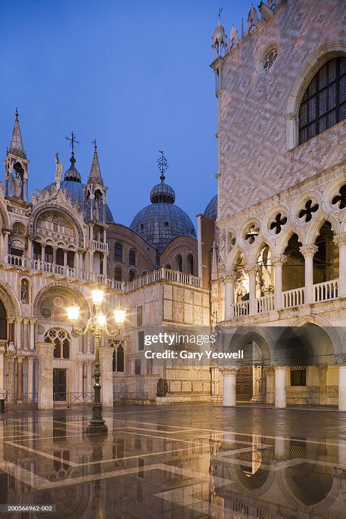 Italy, Venice, St.Mark's Square reflected in wet street