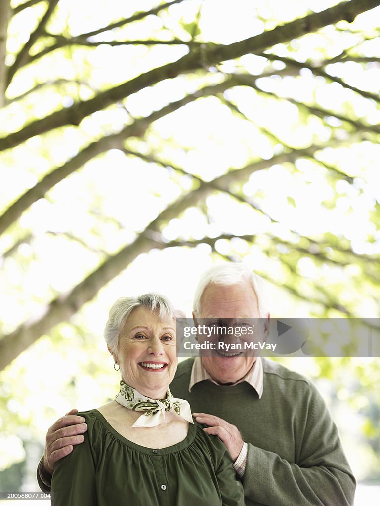 Senior couple smiling, portrait, close-up