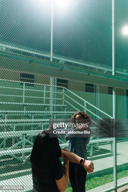 two friends have a post-day workout session - mexico training session stock pictures, royalty-free photos & images