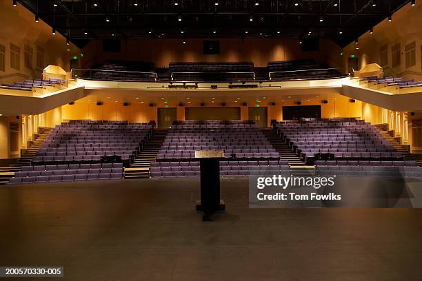 empty illuminated auditorium - auditoria stockfoto's en -beelden