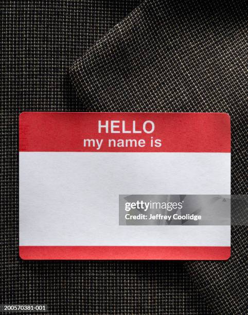 blank name badge on dress jacket  - identidad fotografías e imágenes de stock