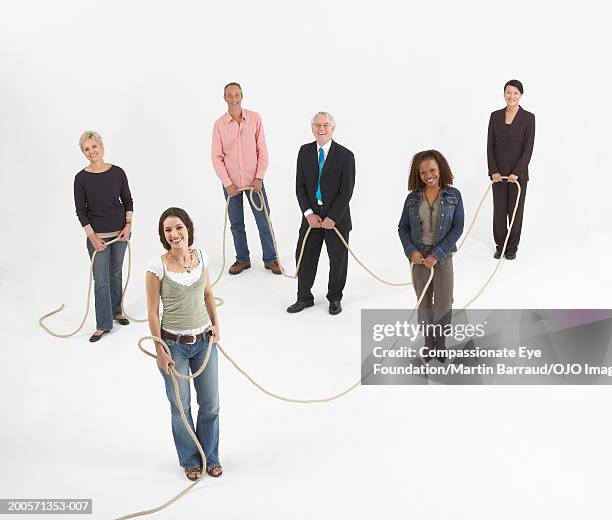 People Use Rope Group Of People Holding Rope Portrait Elevated View High-Res Stock ...