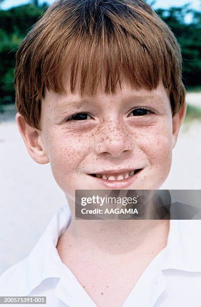 boy (8-9) smiling, portrait, close-up - boy freckle stock pictures, royalty-free photos & images