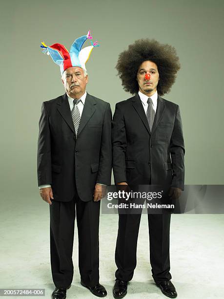 two business men wearing clown hat and nose, portrait - a fool stock pictures, royalty-free photos & images