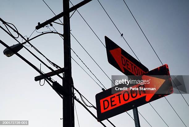detour sign and utility pole, low angle view - detour stock pictures, royalty-free photos & images