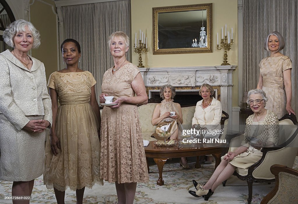 Senior and mature women at tea party, portrait