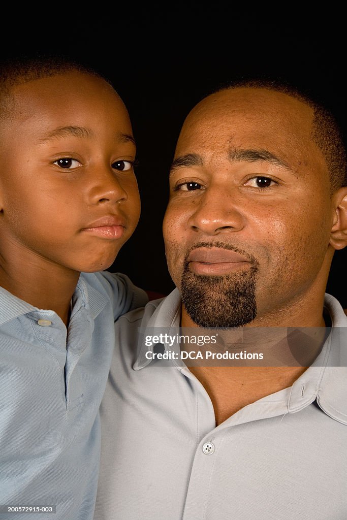 Father and son (6-7 years), portrait, head and shoulders