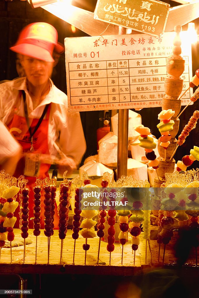 Fruit stall at market, night