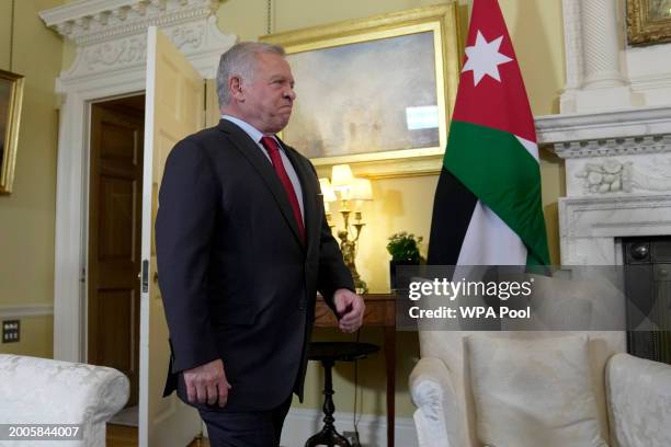 His Majesty King Abdullah II of Jordan walks into the room to meet with UK Prime Minister Rishi Sunak in 10 Downing Street on February 15, 2024 in...