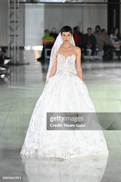 Model walks the runway at the Naeem Khan fashion show during February 2024 New York Fashion Week on February 12, 2024 in New York City.