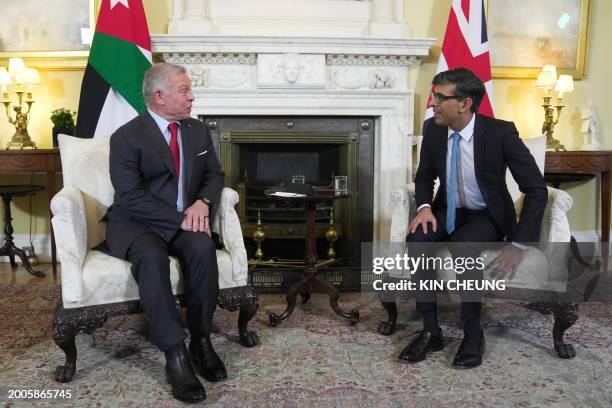 Britain's Prime Minister Rishi Sunak and Jordan's King Abdullah II speak during a meeting at 10 Downing Street, central London, on February 15, 2024.