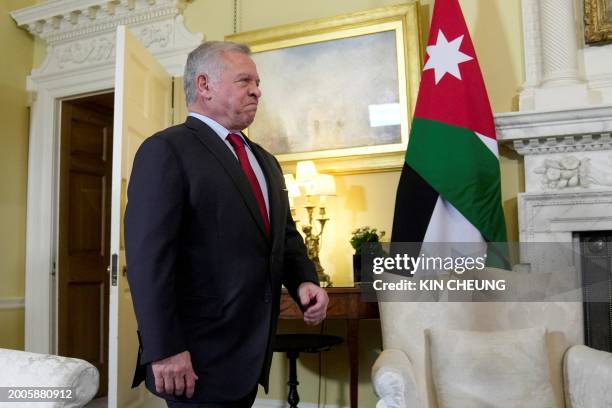 Jordan's King Abdullah II reacts as he arrives for a meeting with Britain's Prime Minister Rishi Sunak at 10 Downing Street, central London, on...
