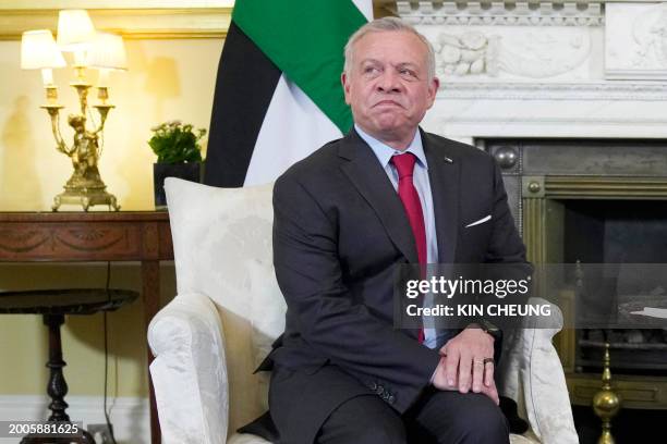Jordan's King Abdullah II reacts as he arrives for a meeting with Britain's Prime Minister Rishi Sunak at 10 Downing Street, central London, on...