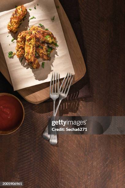 tater tots on a rustoc background - stenklump bildbanksfoton och bilder