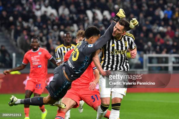 Arkadiusz Milik of Juventus challenged by Maduka Okoye of Udinese Calcio during the Serie A TIM match between Juventus and Udinese Calcio - Serie A...