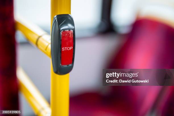 close-up of the stop button of a public bus - warsaw bus stock pictures, royalty-free photos & images