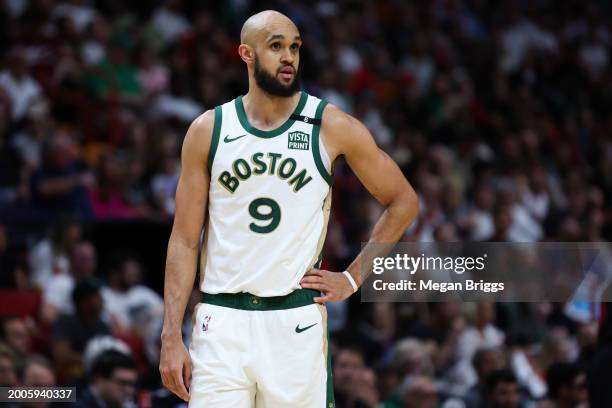 Derrick White of the Boston Celtics looks on against the Miami Heat during the second quarter of the game at Kaseya Center on February 11, 2024 in...