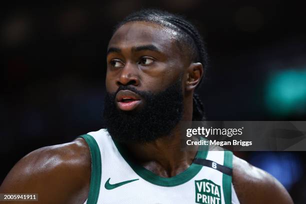 Jaylen Brown of the Boston Celtics looks on against the Miami Heat during the second quarter of the game at Kaseya Center on February 11, 2024 in...