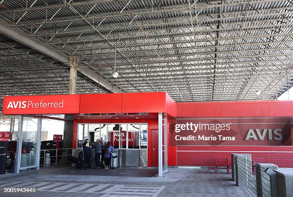 Avis Rental Sign Signs mark the location of an Avis car rental facility on February ...