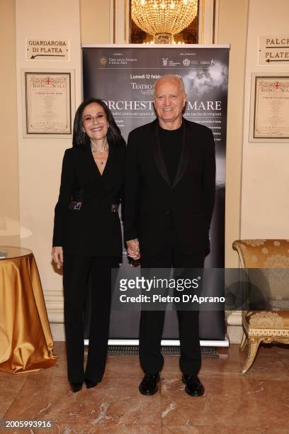 Francesca De Stefano and Santo Versace attends a photocall for "L'Orchestra Del Mare" at Teatro Alla Scala on February 12, 2024 in Milan, Italy.