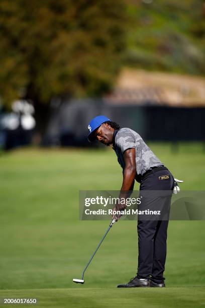 Kristopher Stiles putts on the 10th green during the 2024 Collegiate Showcase prior to The Genesis Invitational at Riviera Country Club on February...