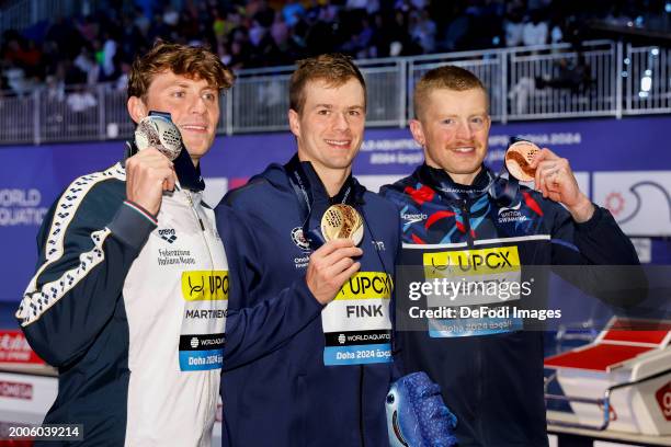 Nic Fink of United States of America wins the gold medal and Nicolo Martinenghi of Italy wins the silver medal and Adam Peaty of Great Britain wins...