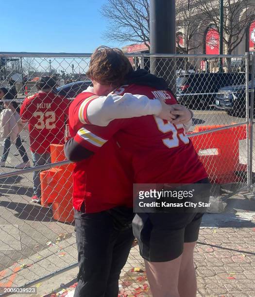 Hank Hunter, left, and Gabe Wallace embraced after reuniting following the shooting at the Kansas City Chiefs Super Bowl parade.